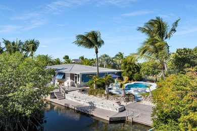 Welcome to this spacious canal-front retreat set on an oversized - photo 4