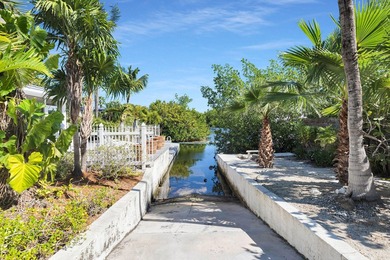 Welcome to this spacious canal-front retreat set on an oversized - photo 5