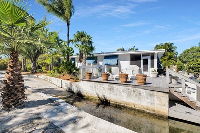 Welcome to this spacious canal-front retreat set on an oversized - photo 6