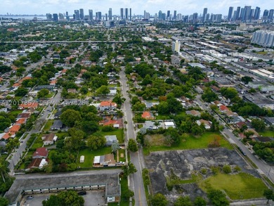 A 6,900 SF vacant lot (approx. 50' frontage x 140' depth) in one - photo 4