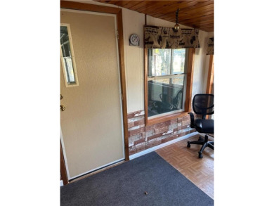 This well cared for two-bedroom manufactured home in a 55+ Pine