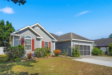 Welcome to this charming 3-bedroom, 2-bath home offering an - photo 1
