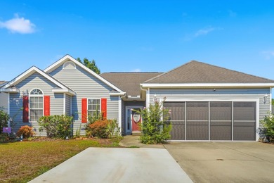 Welcome to this charming 3-bedroom, 2-bath home offering an - photo 2