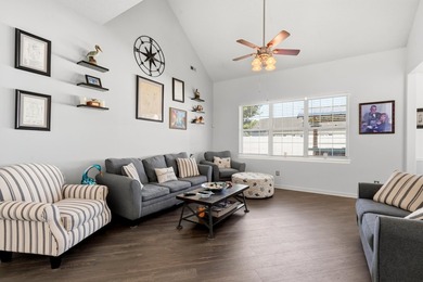 Welcome to this charming 3-bedroom, 2-bath home offering an - photo 4