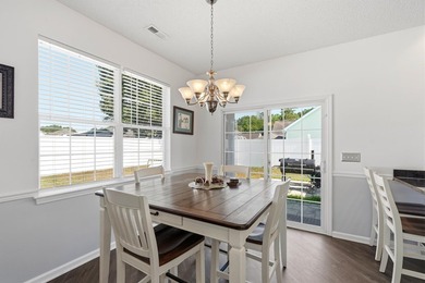 Welcome to this charming 3-bedroom, 2-bath home offering an - photo 8