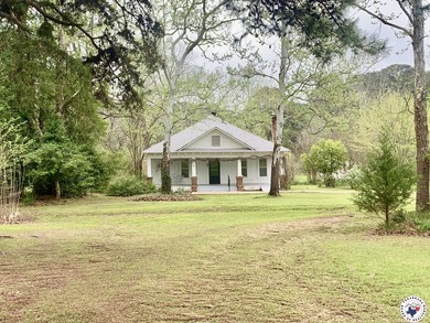 Nestled in a picturesque setting just 3.8 miles from town, this