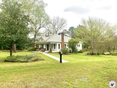 Nestled in a picturesque setting just 3.8 miles from town, this