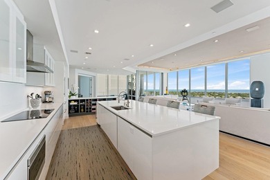 This amazing penthouse suite occupies the entire top floor of - photo 54