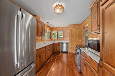 Discover your dream home on the coveted Spider Lake Chain! This - photo 8
