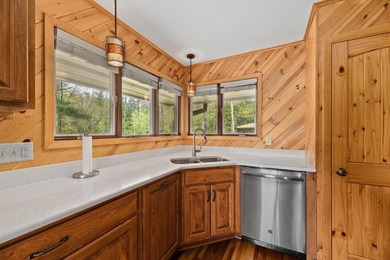 Discover your dream home on the coveted Spider Lake Chain! This - photo 9