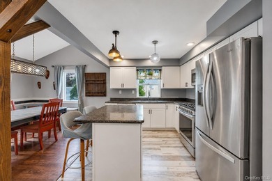 Welcome to 115 Dahlia Drive, a beautifully maintained 4-bedroom - photo 9