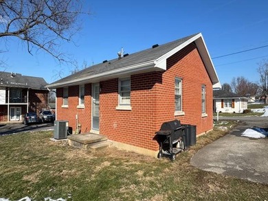 This charming 2-bedroom, 1-bath brick ranch is located within - photo 2