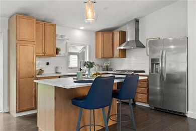 Tucked away in a peaceful setting, this three-bedroom - photo 8