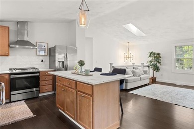 Tucked away in a peaceful setting, this three-bedroom - photo 10
