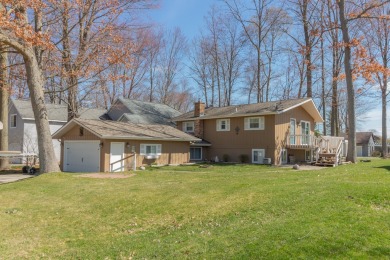 Lake Home For Sale in Canadian Lakes, Michigan