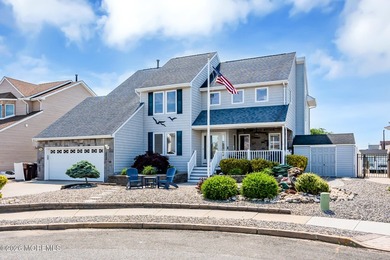 Welcome to 26 Jib Court, a spectacular waterfront retreat tucked - photo 3