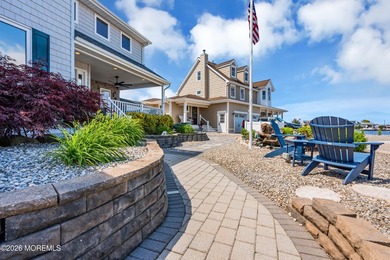 Welcome to 26 Jib Court, a spectacular waterfront retreat tucked - photo 4