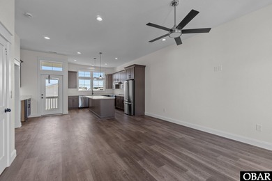 This newly constructed 3-bedroom, 3.5-bathroom townhome offers