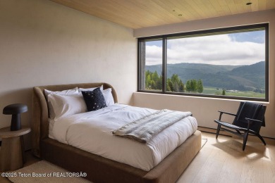 Overlooking the open valley with framed views of Sleeping Indian
