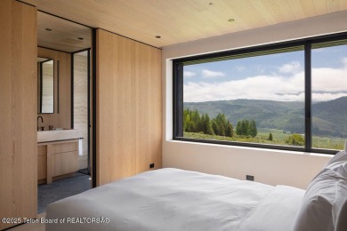 Overlooking the open valley with framed views of Sleeping Indian