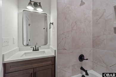 This newly constructed 3-bedroom, 3.5-bathroom townhome offers