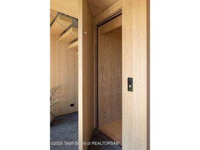 Overlooking the open valley with framed views of Sleeping Indian