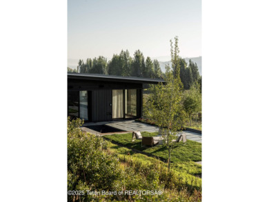 Overlooking the open valley with framed views of Sleeping Indian