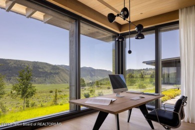 Overlooking the open valley with framed views of Sleeping Indian