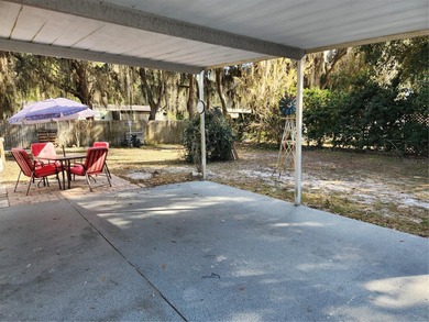 Welcome to this charming 3-bedroom, 2-bathroom mobile home. This - photo 8