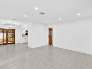 This 3-bedroom, 2-bathroom house is located in a quiet corner of - photo 3
