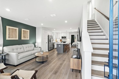 Experience the best of low maintenance living and coastal luxury - photo 4