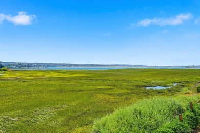 Wake each morning to the gentle shimmer of Mission Bay, where - photo 3