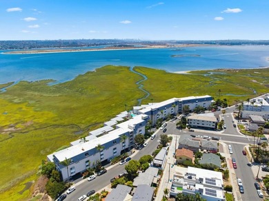 Wake each morning to the gentle shimmer of Mission Bay, where - photo 5