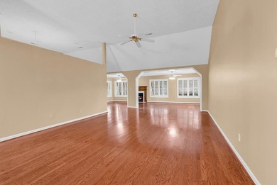 Nestled beneath mature oaks, this custom all-brick home offers a - photo 5