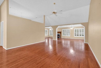 Nestled beneath mature oaks, this custom all-brick home offers a - photo 7