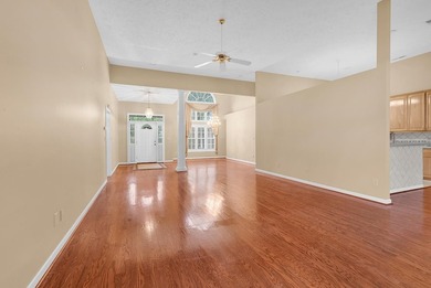 Nestled beneath mature oaks, this custom all-brick home offers a - photo 8