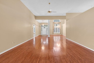 Nestled beneath mature oaks, this custom all-brick home offers a - photo 9