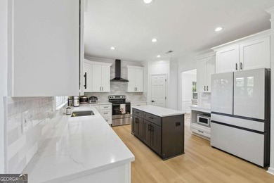 Completely renovated in 2025, this move-in-ready home is located - photo 14