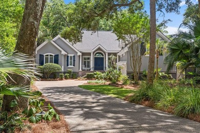 Tucked behind mature canopy on a rare, private one acre double - photo 1