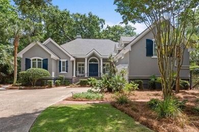 Tucked behind mature canopy on a rare, private one acre double - photo 3