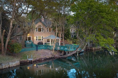 Welcome to 759 Lake Frances Drive--a waterfront retreat where - photo 1