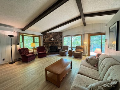Nestled on a wooded lot on beautiful 204 AC BOOTH lake, this - photo 5