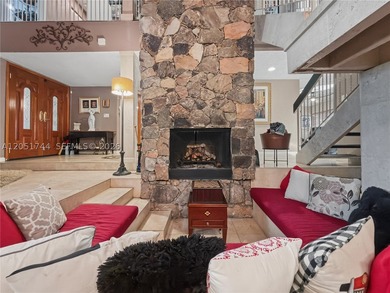 Tucked behind a private, palm-lined entrance in sought-after - photo 11