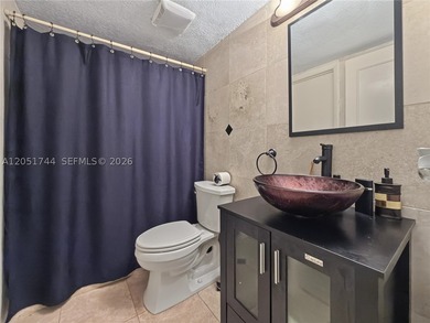 Tucked behind a private, palm-lined entrance in sought-after - photo 12