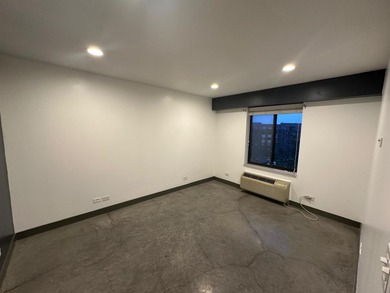 Modern loft-inspired living meets suburban convenience in this