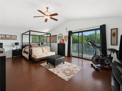 Tucked behind a private, palm-lined entrance in sought-after - photo 15