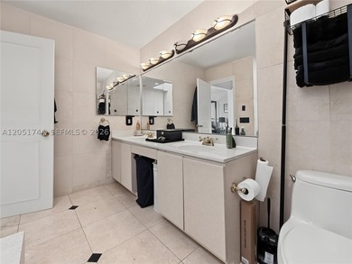 Tucked behind a private, palm-lined entrance in sought-after - photo 19