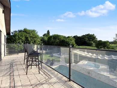 Tucked behind a private, palm-lined entrance in sought-after - photo 20