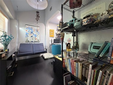 Tucked behind a private, palm-lined entrance in sought-after - photo 22