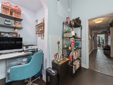 Tucked behind a private, palm-lined entrance in sought-after - photo 23